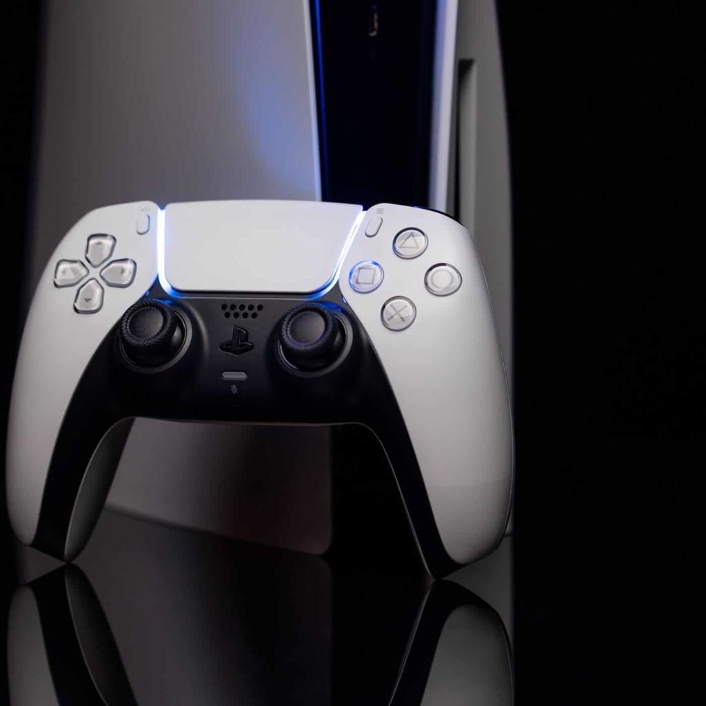 PS5 Controller Propped Against Console