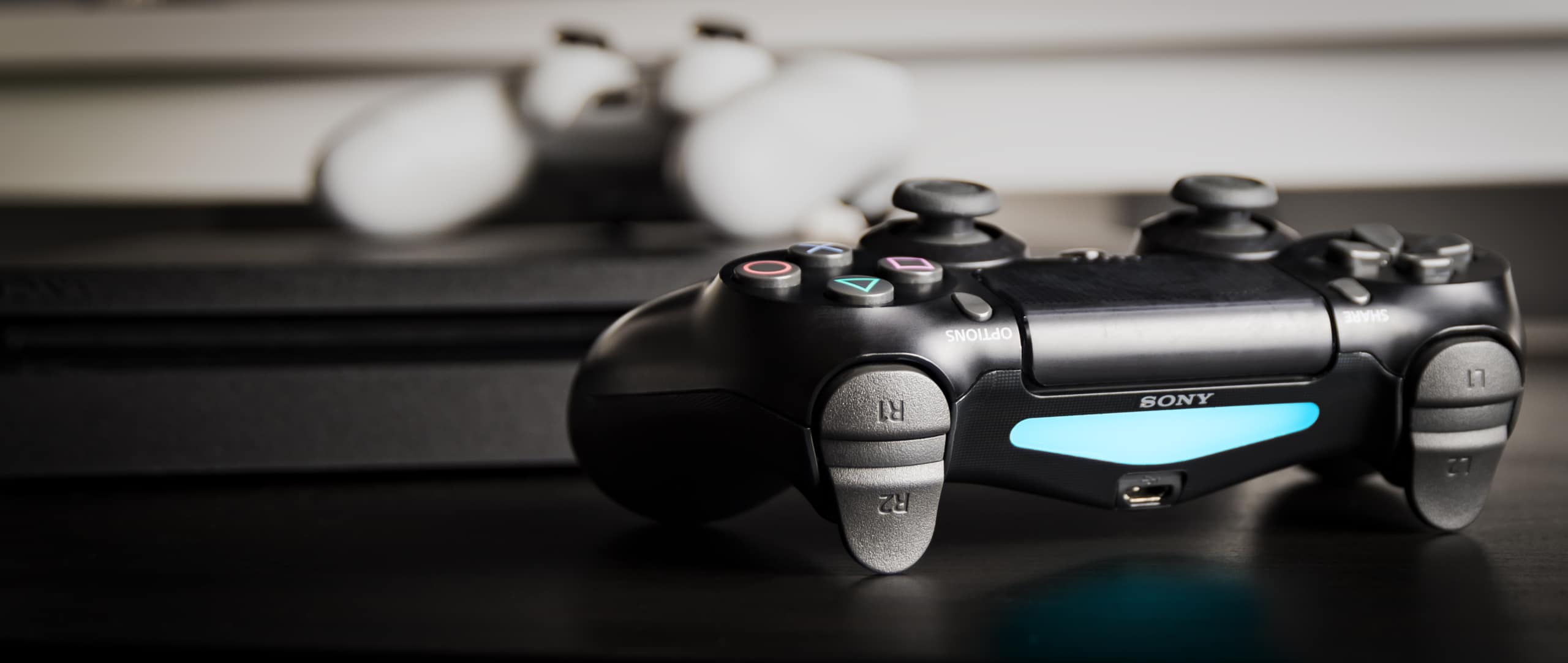 PS4 Controller on Wood Surface