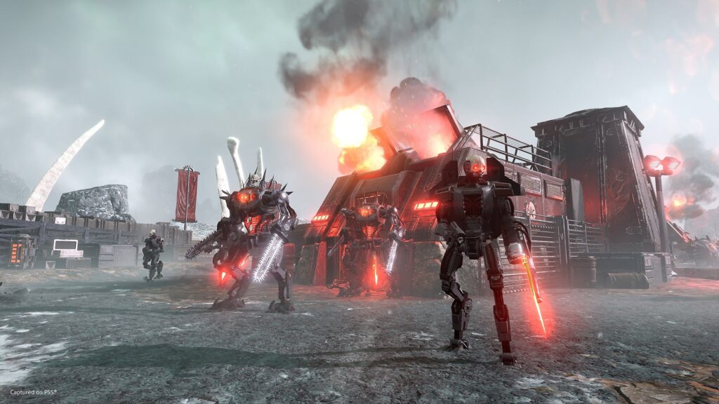 Helldivers II: a squad holds the line as automaton walkers advance through fire